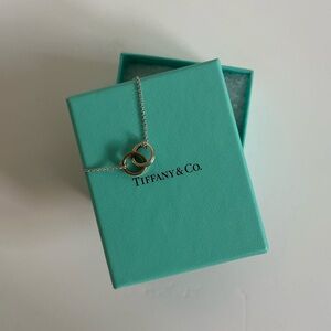 Tiffany & Co. Interlocking Circle bracelet- Silver with Rose Gold Accents